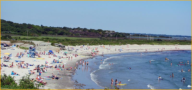 stunning soft sand beaches surround Newport's colonial charm